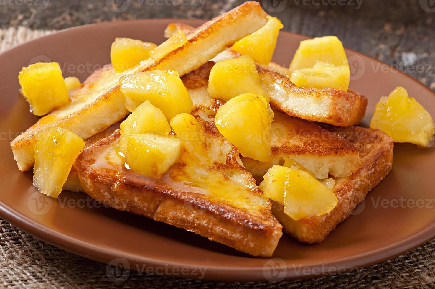 French toast with caramelized apples for breakfast photo