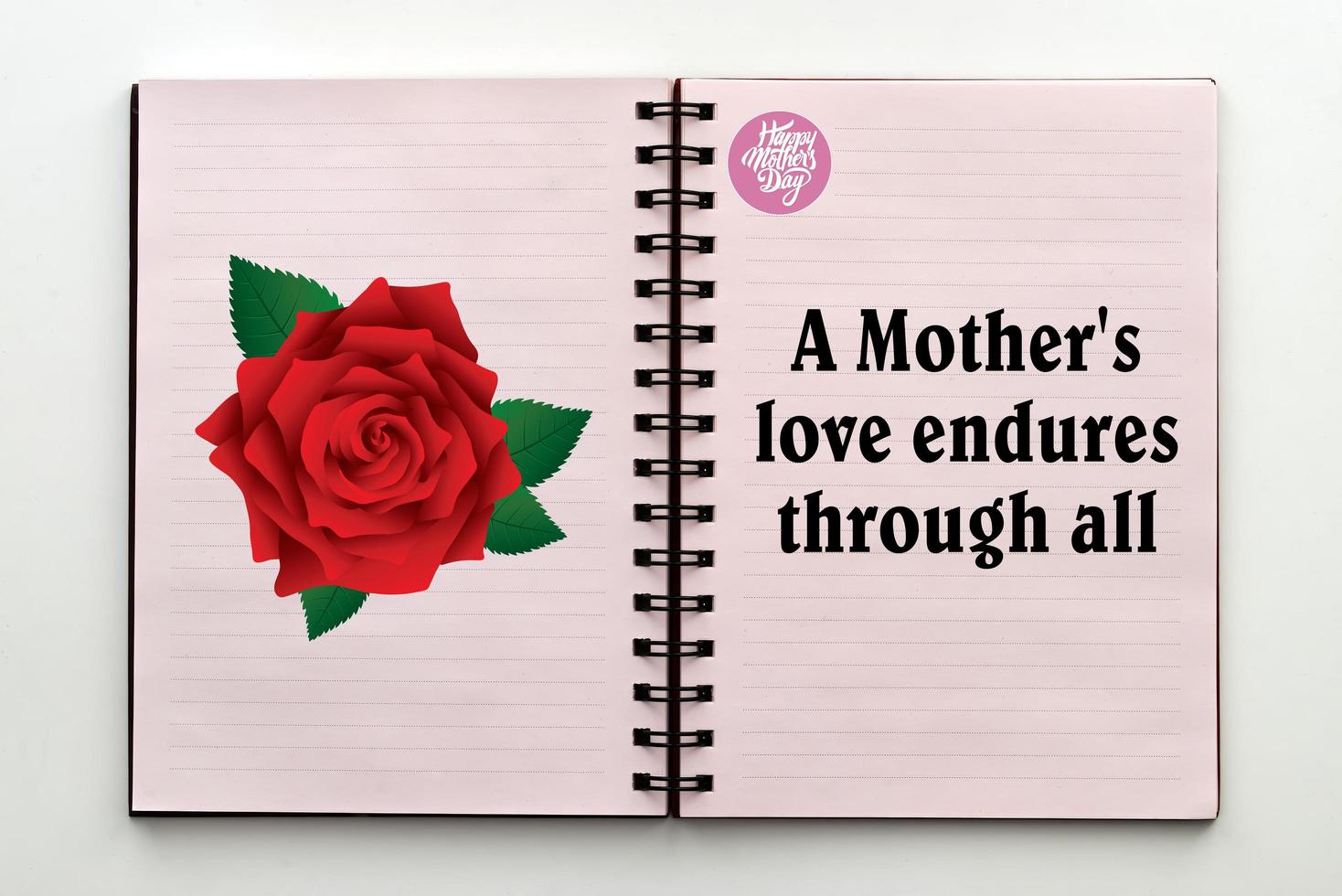 Happy Mother's day with quote written inside an open notebook. photo