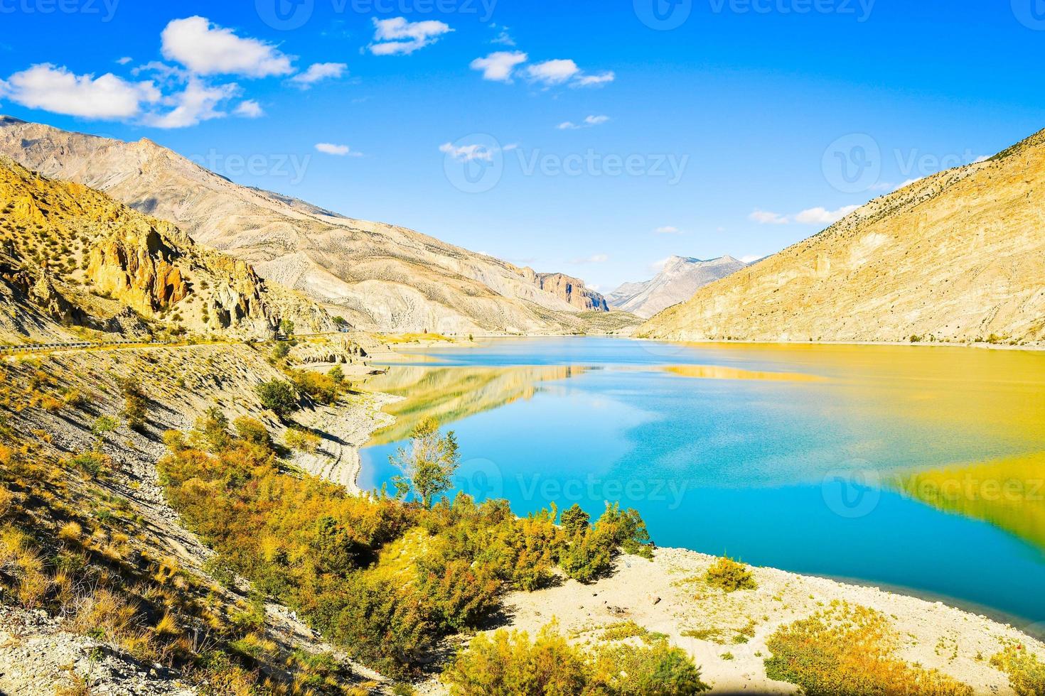 Panoramic view blue water of Chorokhi in Turkey Artvin region with scenic mountains background in clear sunny autumn day photo