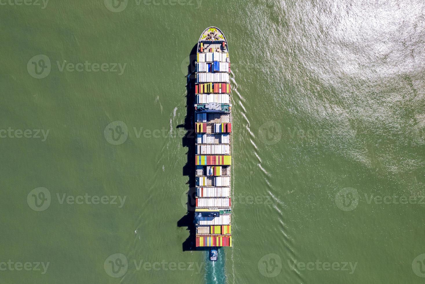 Container Cargo Ship Aerial View, Import Export Business Logistics and International Transport by Container Ship in Open Sea. photo
