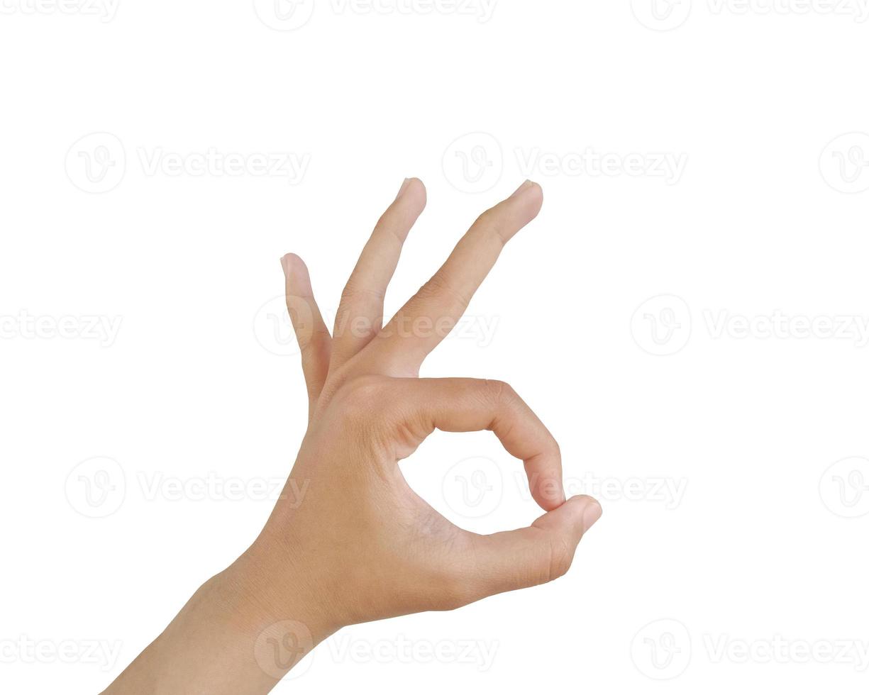 Close up Asian female hand show pinch gesture made, Ok sign finger arm and hand isolated on a white background copy space symbol language okay photo