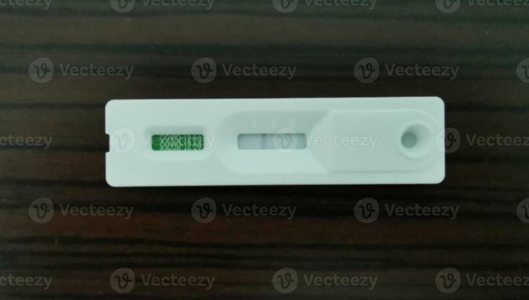 ATK Antigen test kit covid-19 virus test white on black background photo