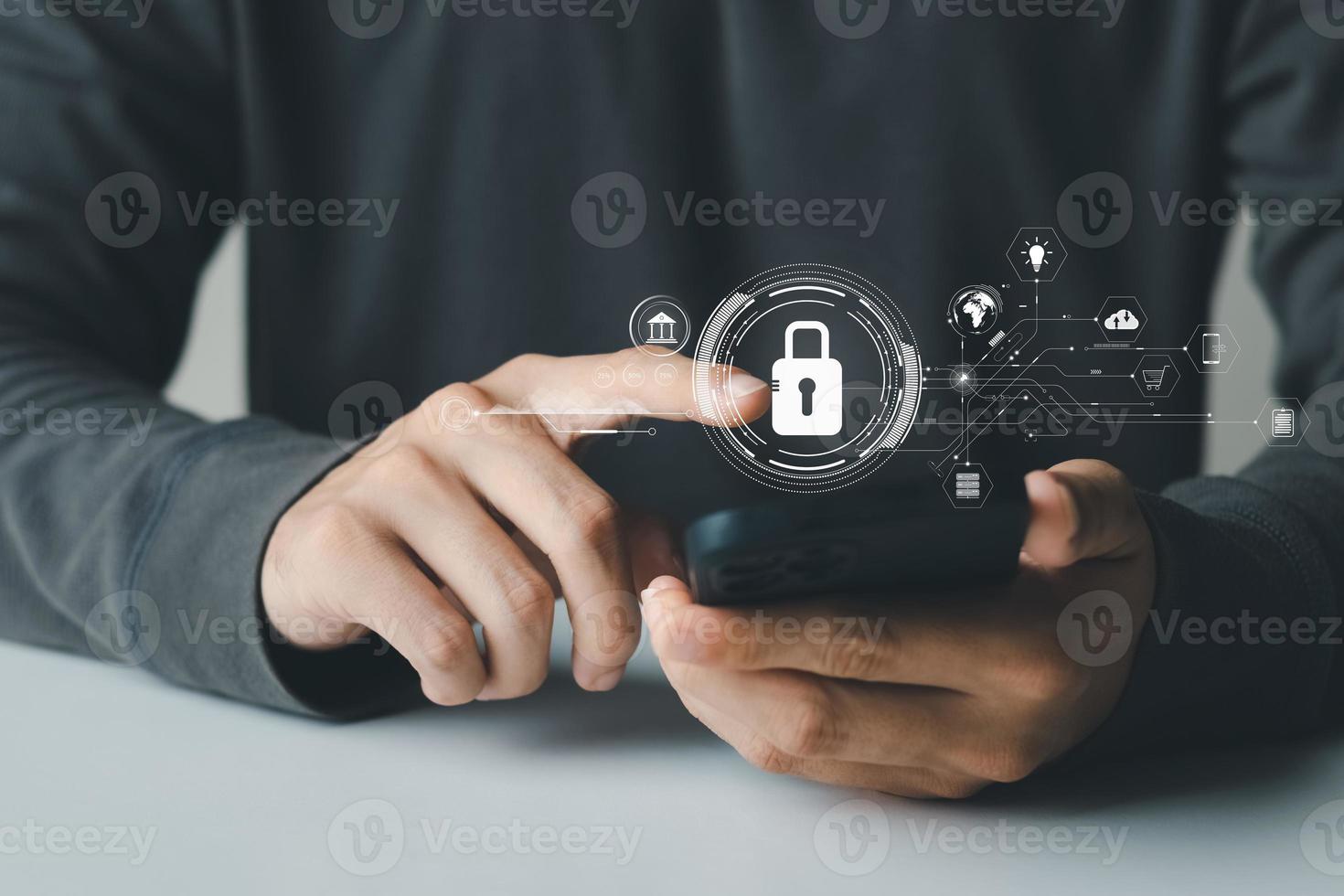 Cybersecurity and privacy concepts to protect data. Lock icon and internet network security technology. Businessmen protecting personal data on smartphone and virtual interfaces. photo