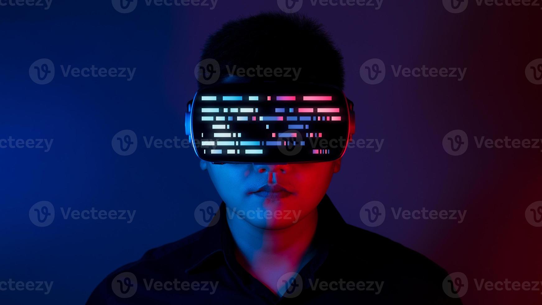 Young man wearing VR goggles. Metaverse technology virtual reality concept. Virtual Reality Device, Simulation, 3D, AR, VR, Innovation and Technology of the Future on Social Media. photo