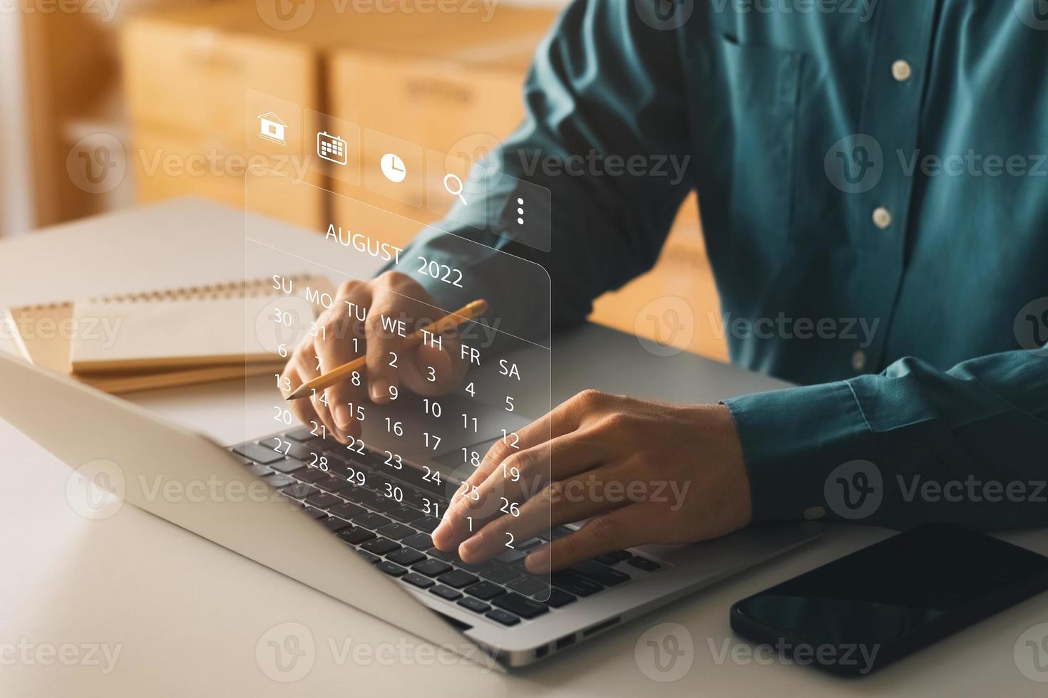 businessman using laptop computer Plan work and update tasks with milestone progress planning and virtual chart scheduling diagrams. photo