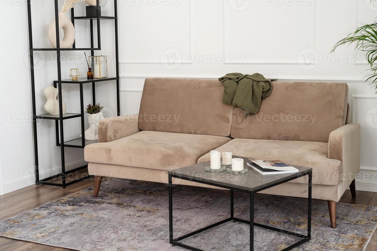 living room interior with coffee table and sofa photo