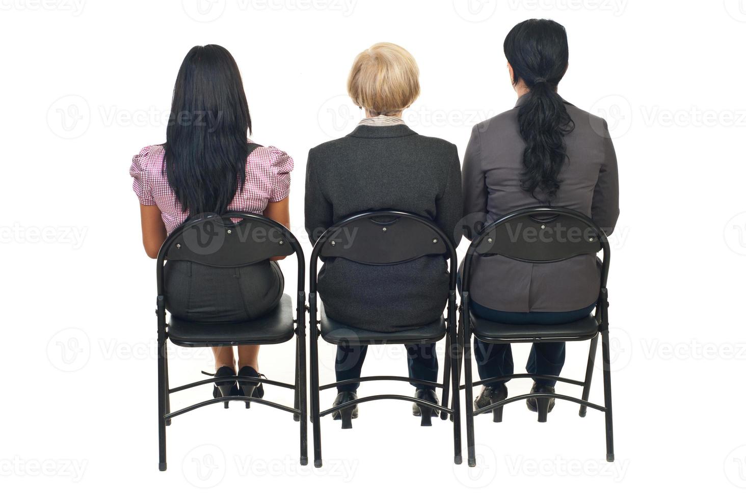 Back of three women at presentation photo