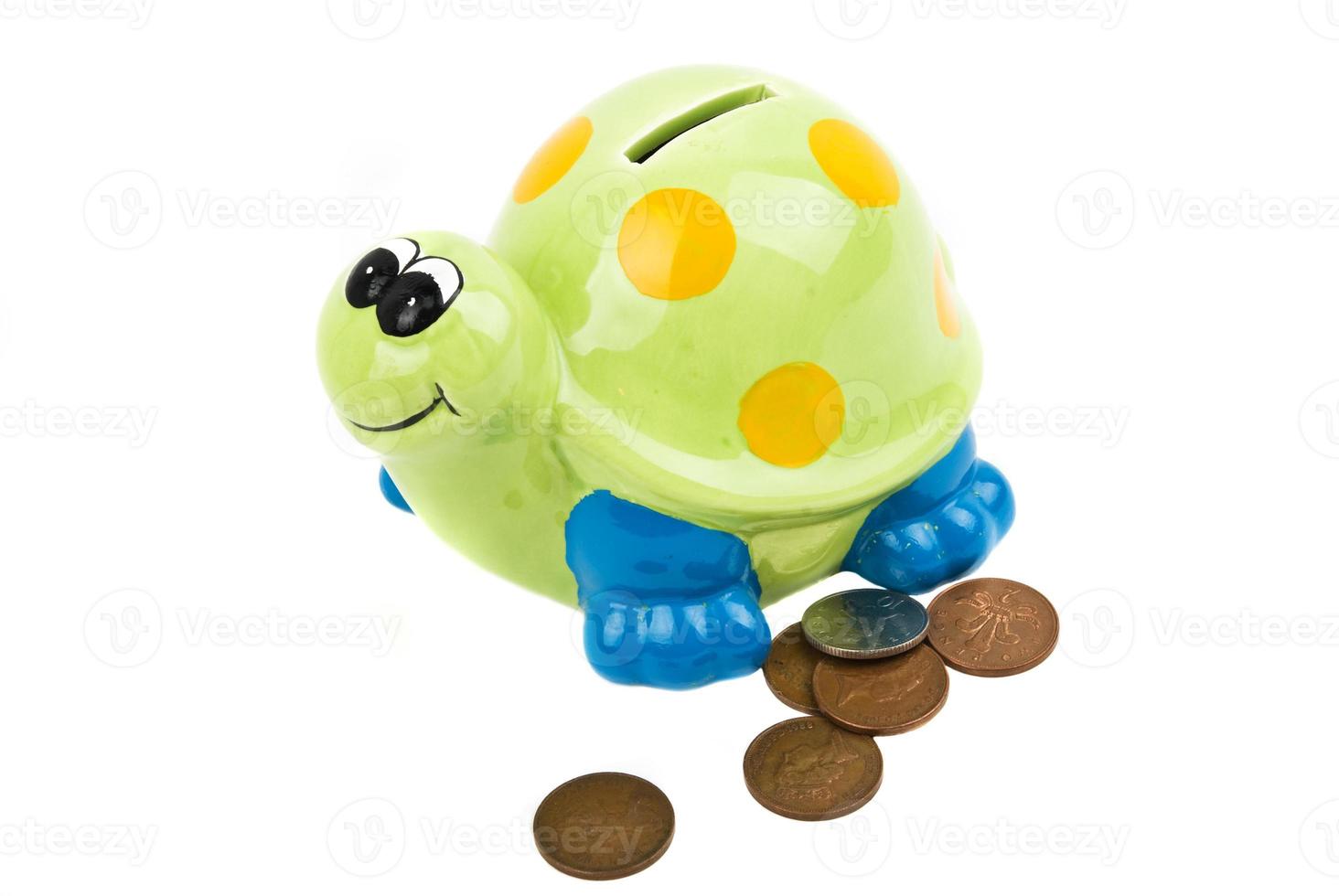 Money box and coins photo