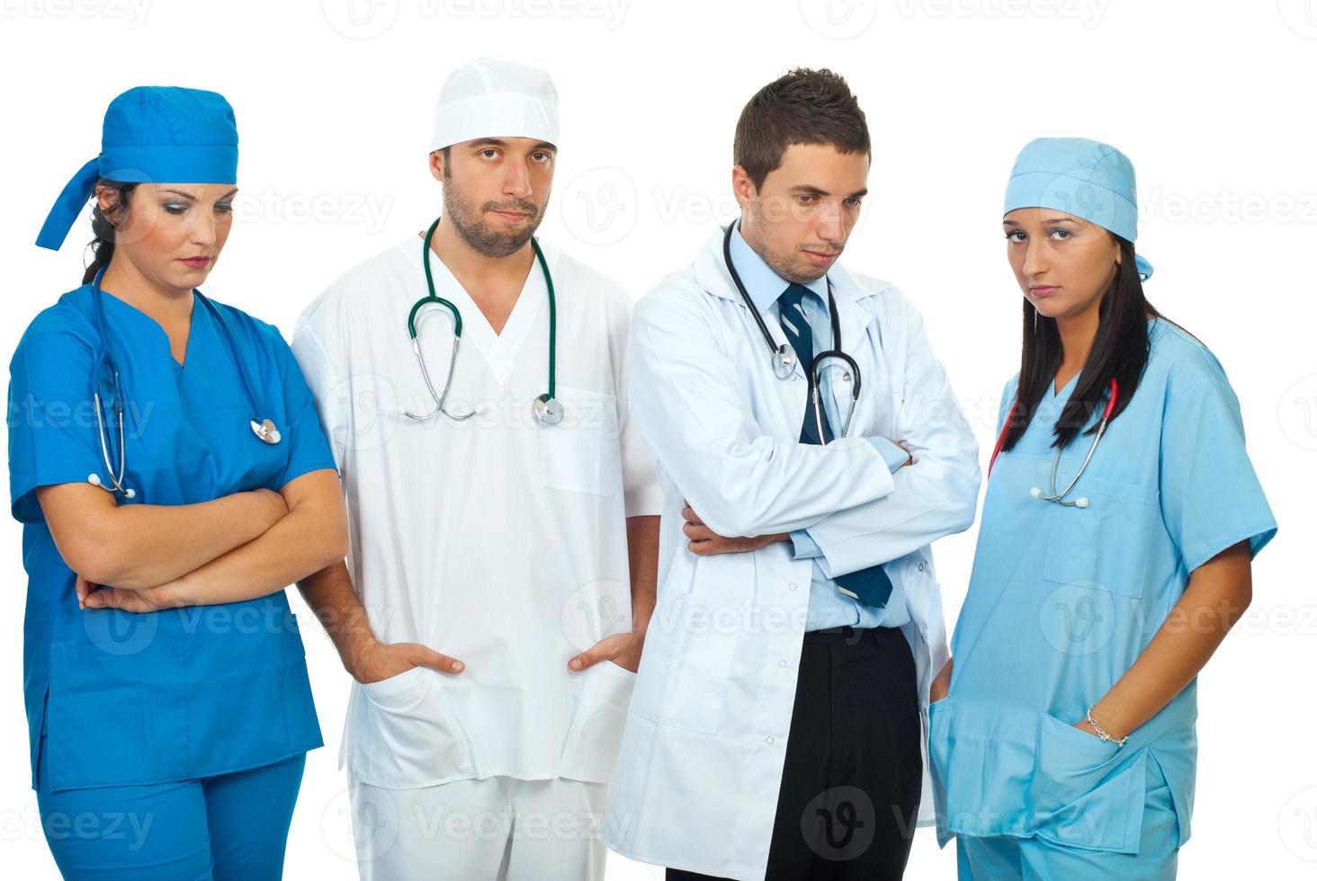 Disappointed team of doctors photo