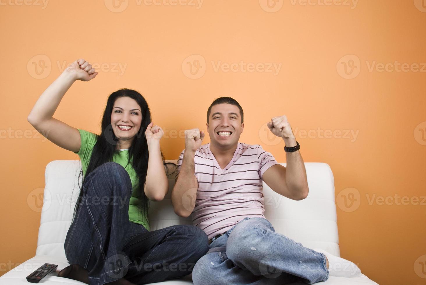 Fans sport team watching TV photo