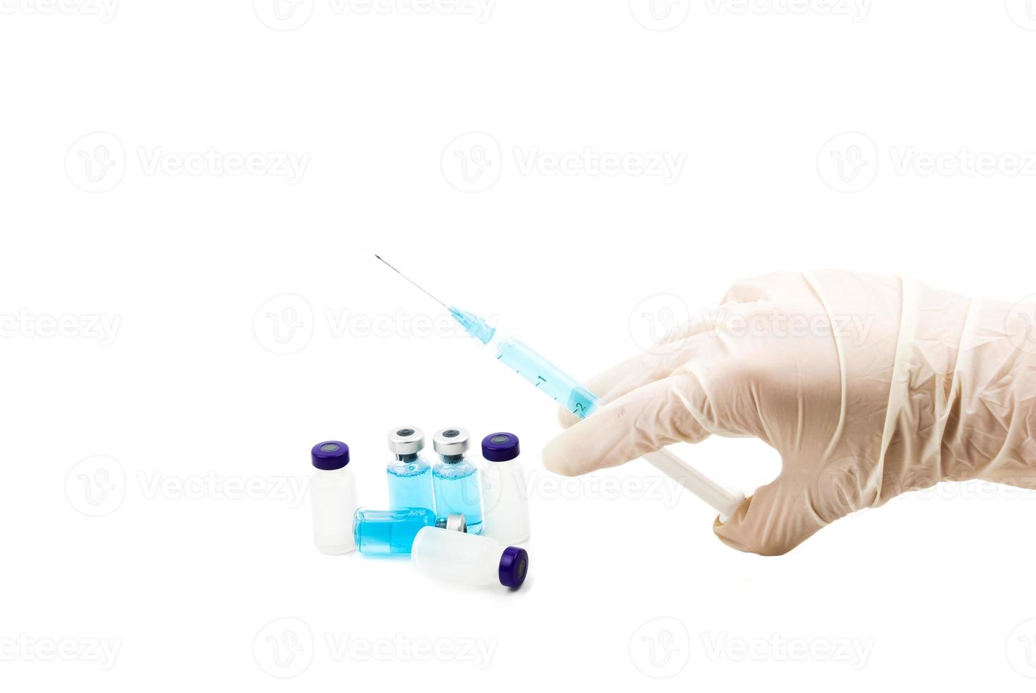 Vaccinations and human hand with syringe photo