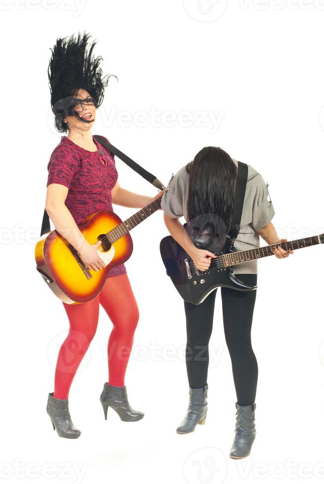 Band of girls with guitars in motion photo