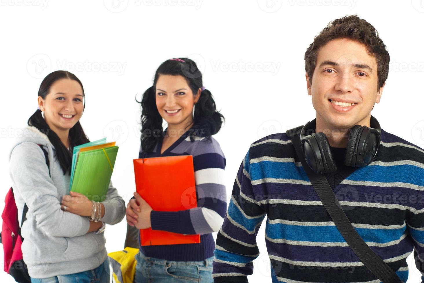Cheerful student guy and his colleagues photo