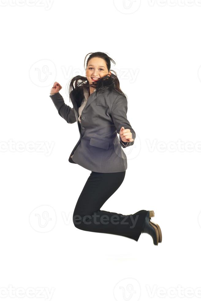 Young executive woman jumping photo