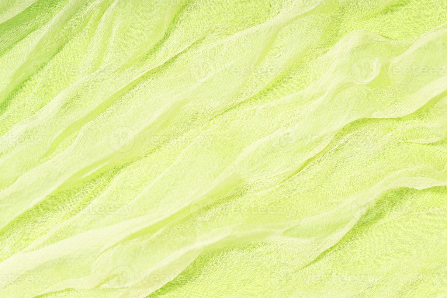 Green Abstract background texture of soft chiffon. Full frame photo