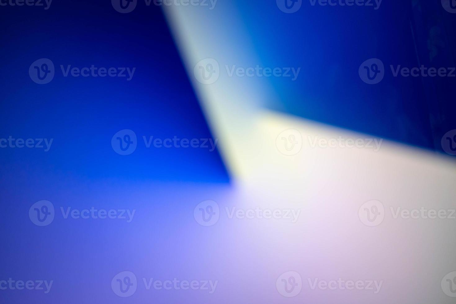 Defocus blurred image of blue and white abstract background. photo