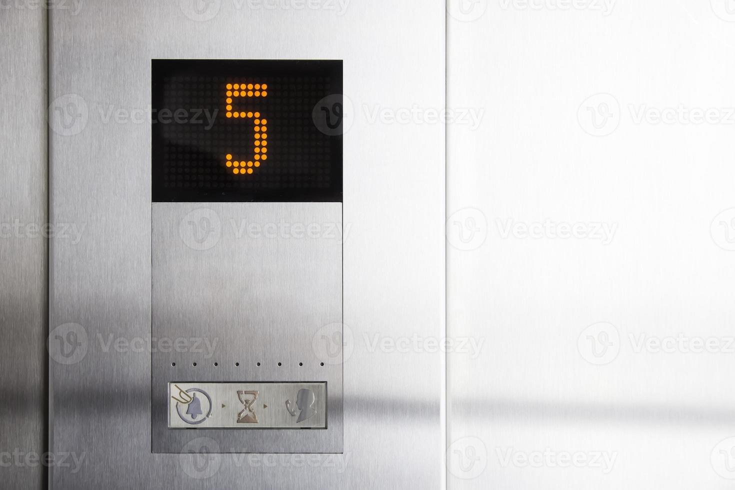 Elevator display with number five floor photo