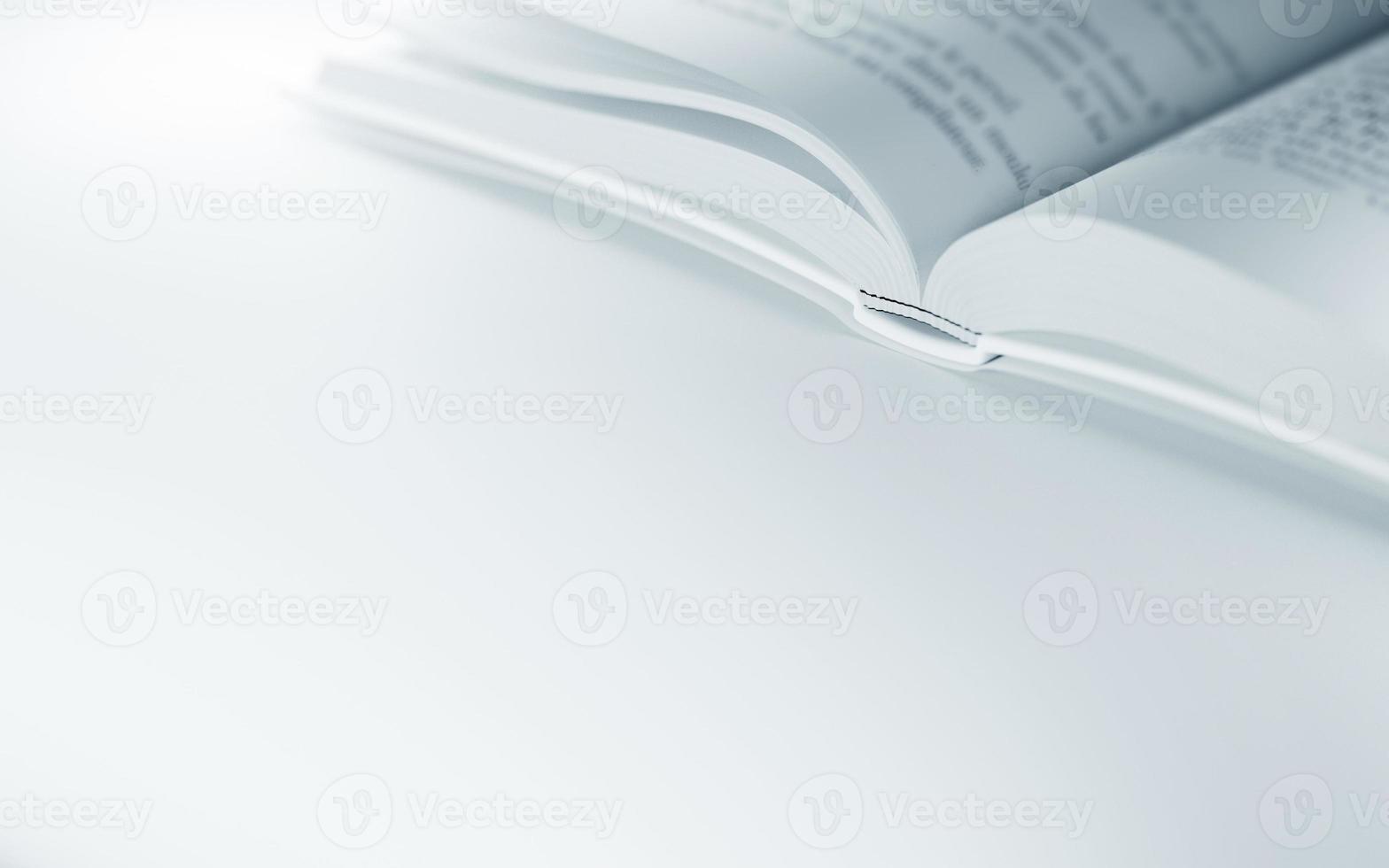Close-up of open book on the white surface. 3d illustration photo