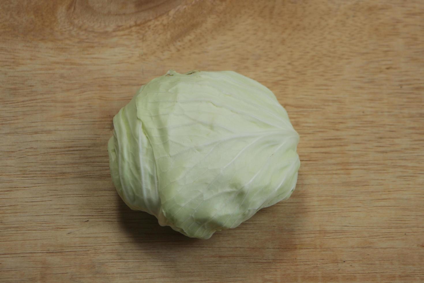 Cauliflower on white on a wooden background photo