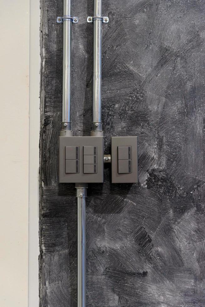 Switch control box on the back wall of factory photo