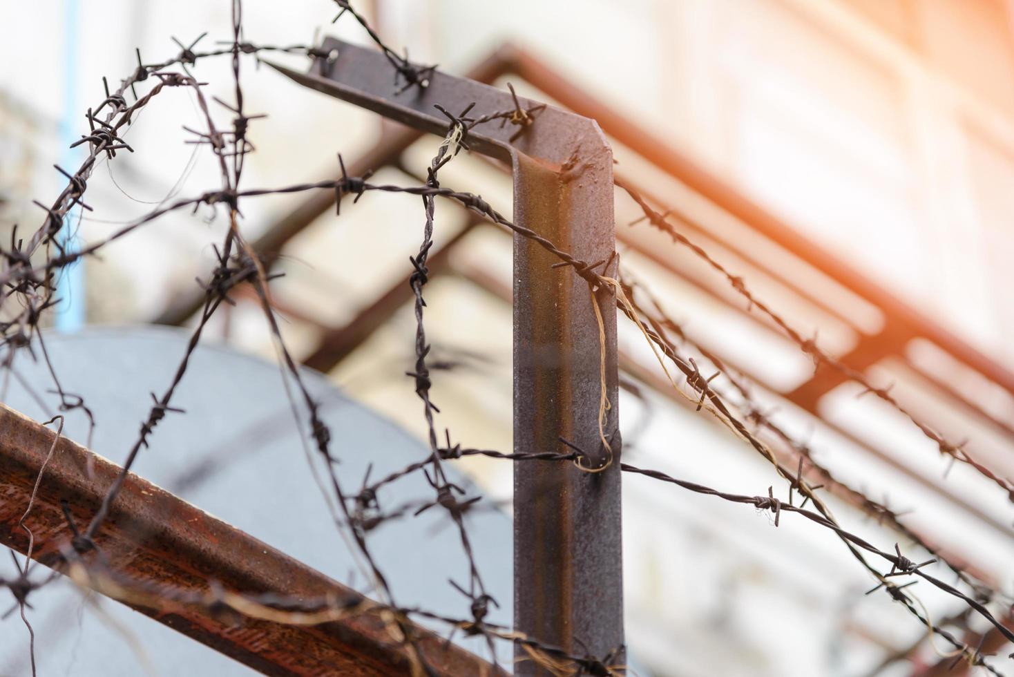 barbed wire fence lack - symbol of danger photo