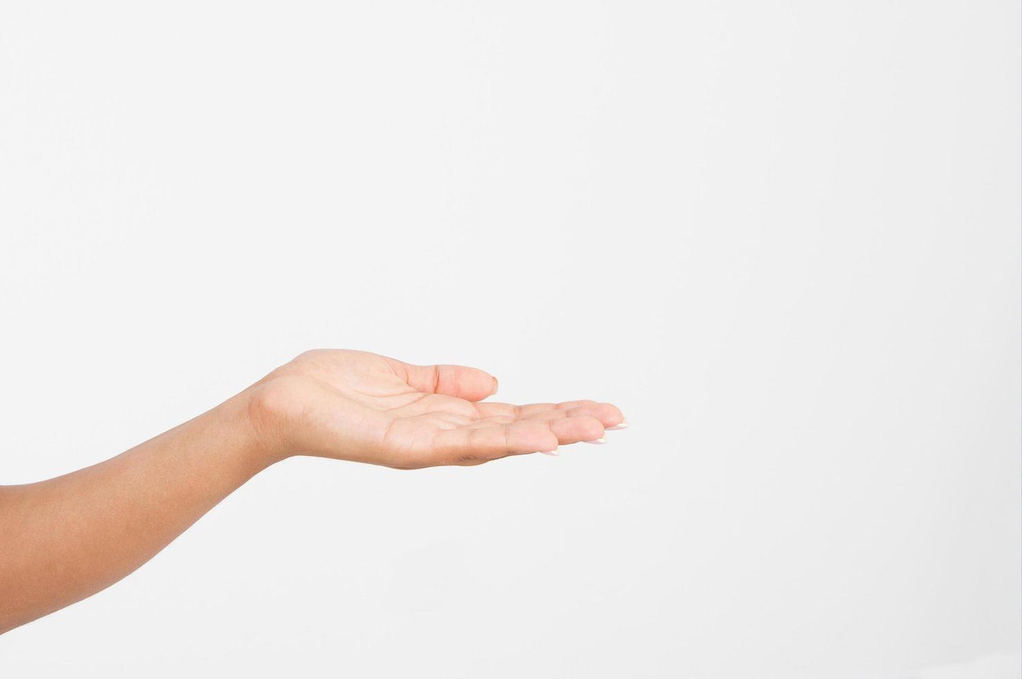 Open a black woman's hand, palm up isolated on white background.Front view. Mock up. Copy space. Template. Blank. photo