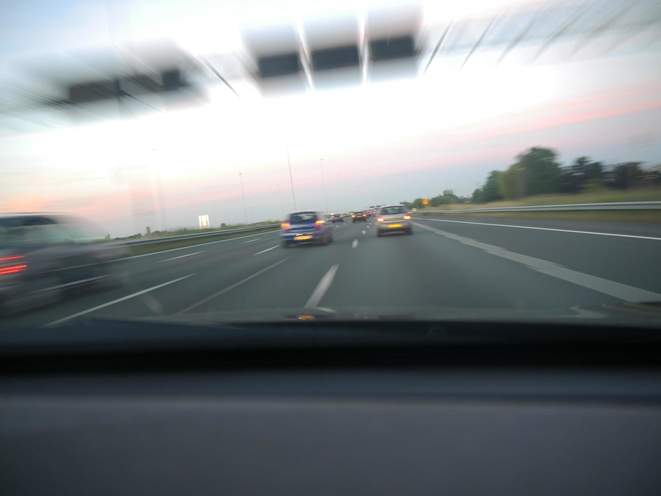 Driving at speed over highway photo