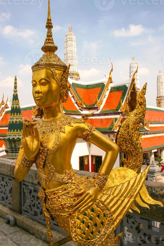 Angle kinnaree sculpture decoration with stained glass in Wat Phra Kaew photo