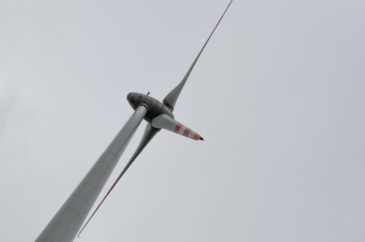 windmill and white sky photo