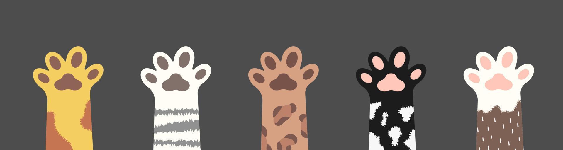 Fluffy cat paws collection. Set of various cute kitten foot silhouettes isolated on gray background. Animals and pets concept. Vector illustration in cartoon style.