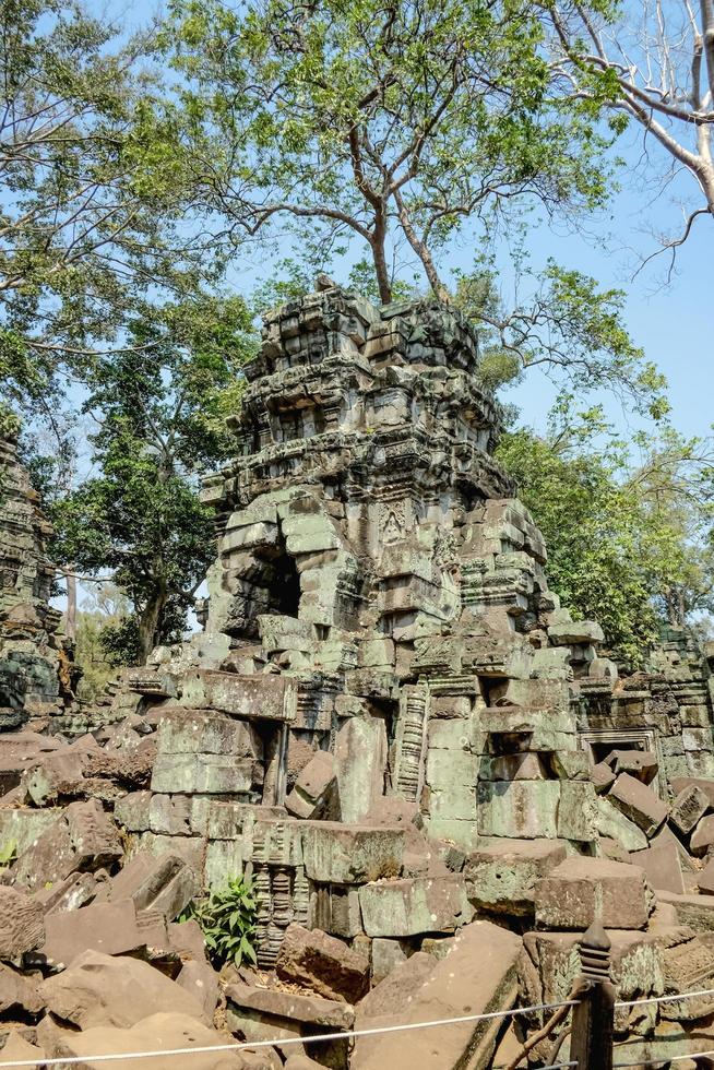 Broken ruin in ta prohm temple area in siem reap cambodia photo