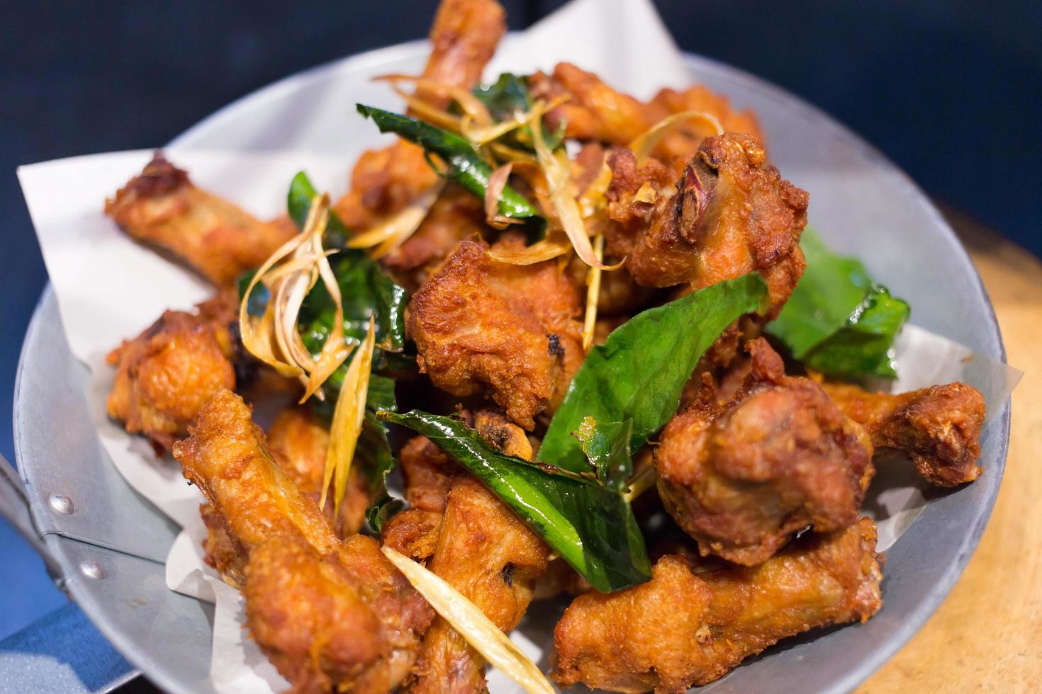 Deep fried chicken with Thai herbs. photo