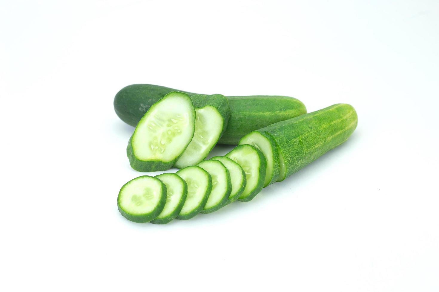 The cucumber on white background photo