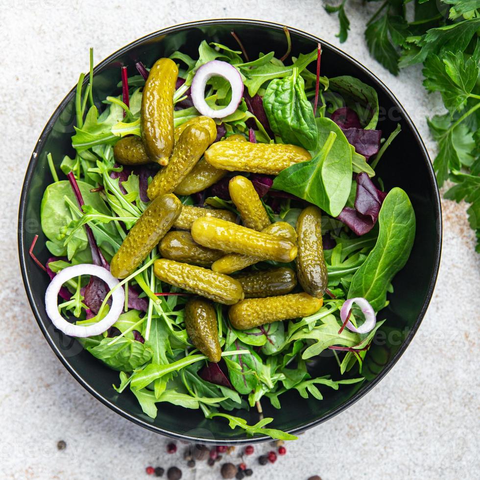 gherkins salad cucumber salty green leaves mix fresh meal food diet snack on the table copy space photo