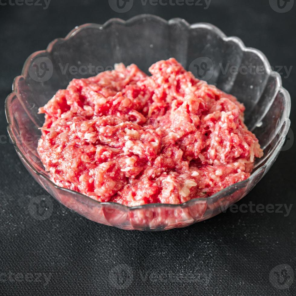 minced meat fresh beef, pork meal food on the table copy space photo