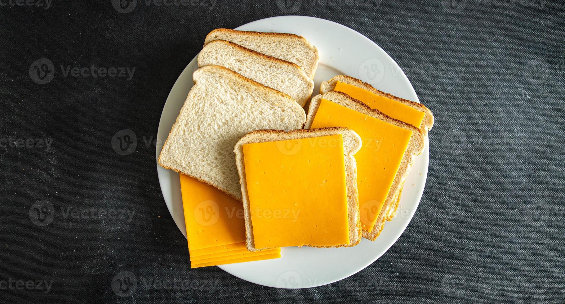 sandwich cheese cheddar mimolette cheeses fresh meal food snack on the table copy space photo