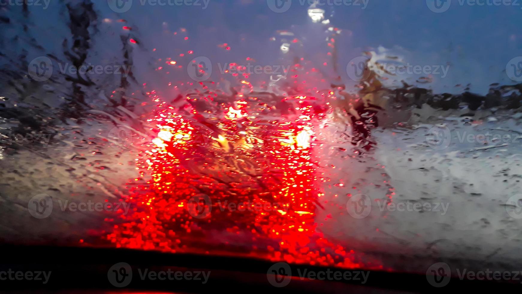 Parking Lights through wet glass photo