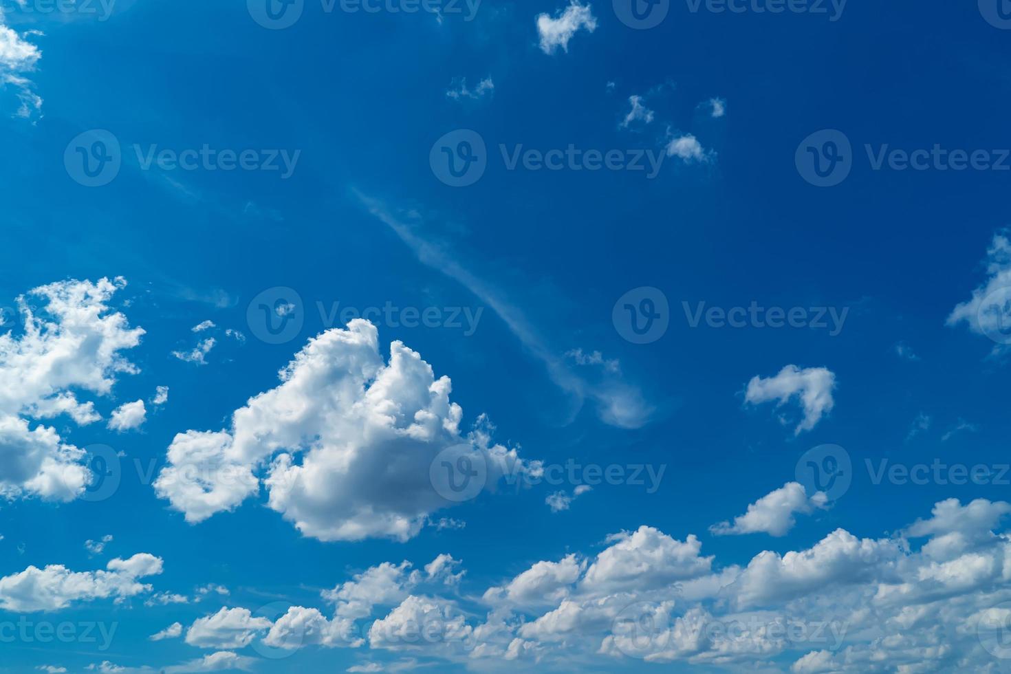 beautiful white clouds on a background of blue sky photo