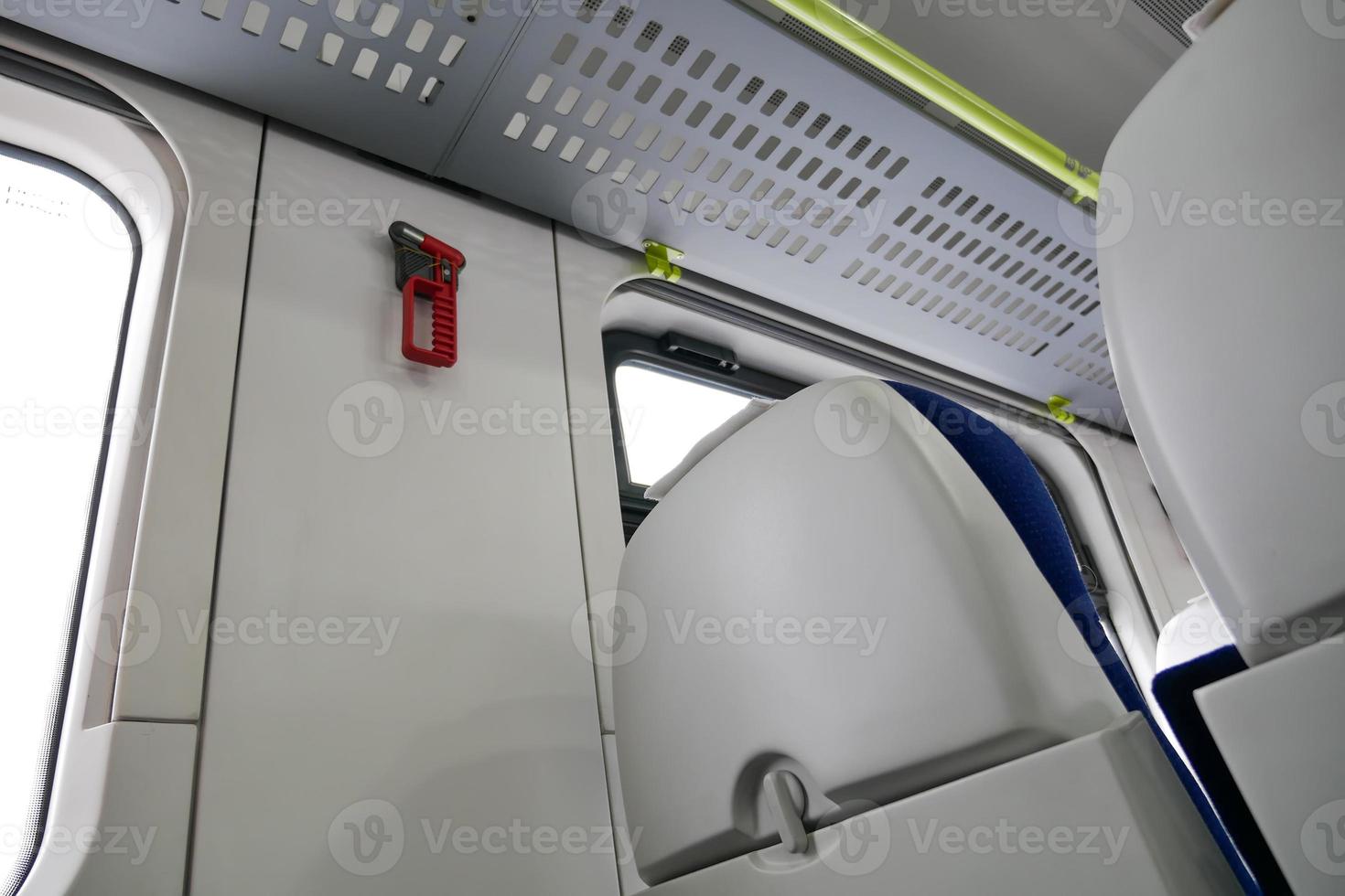 the interior of a modern train, seat backs photo