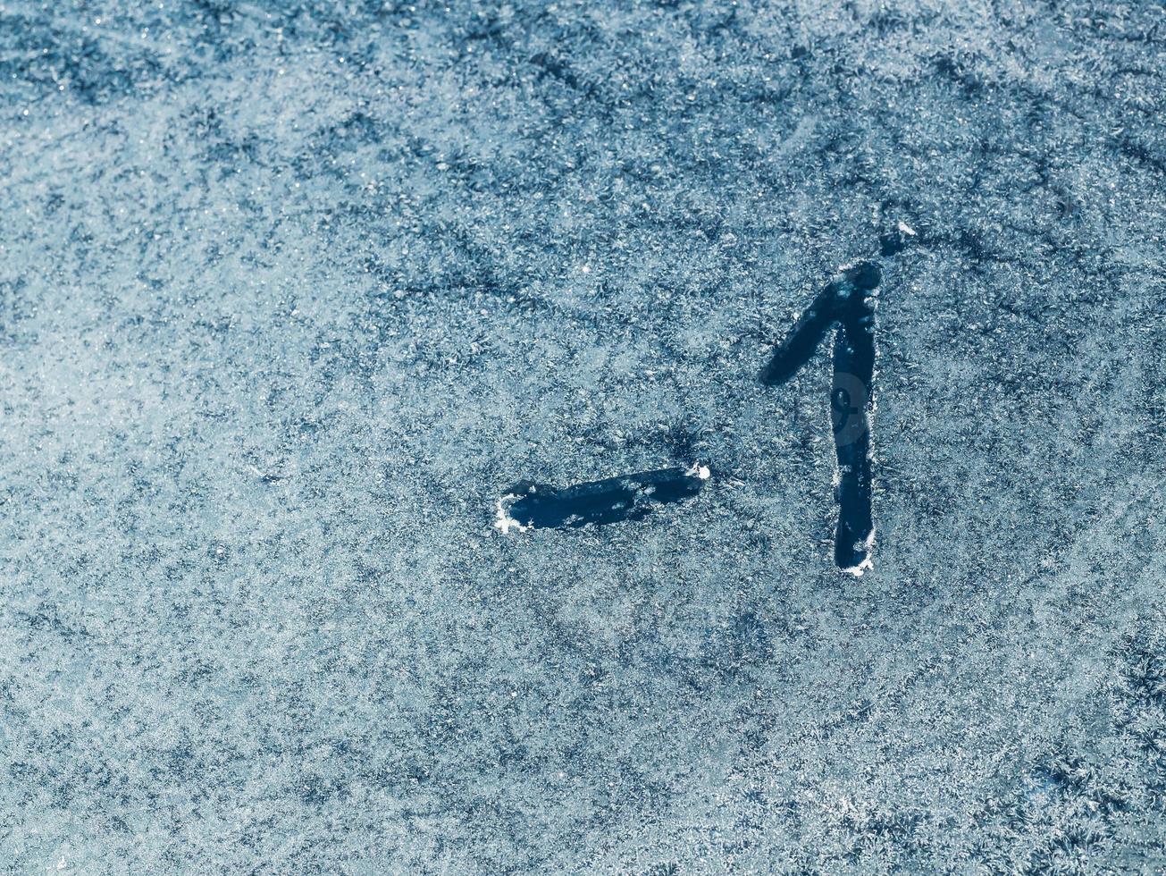 frozen glass of the car. the inscription on the glass photo