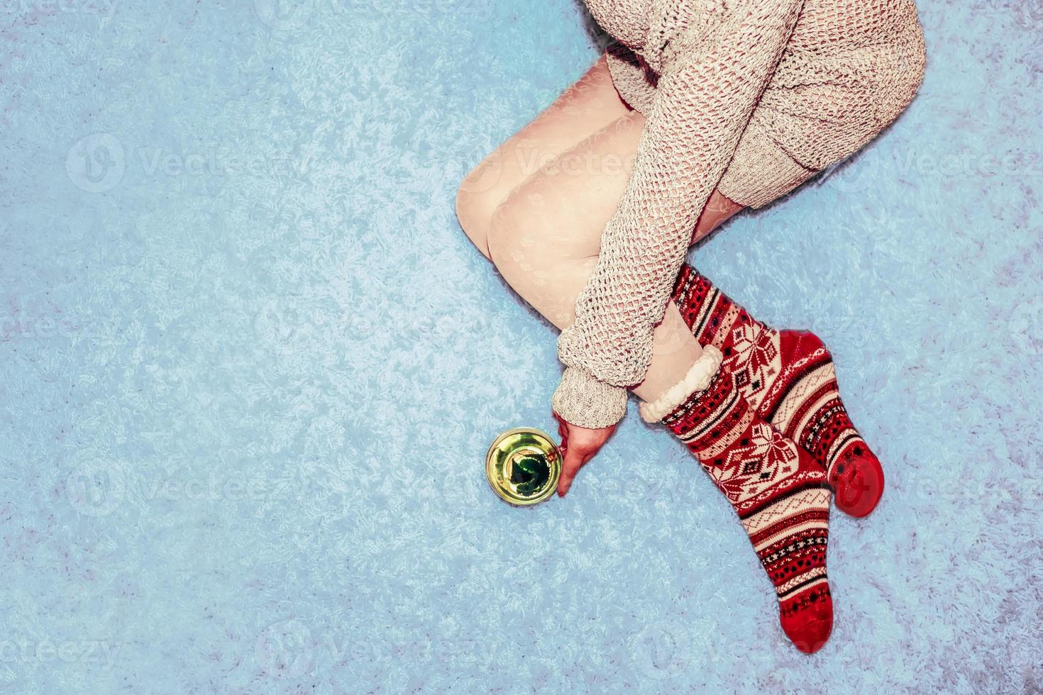 girl in the snow with a Cup of tea photo