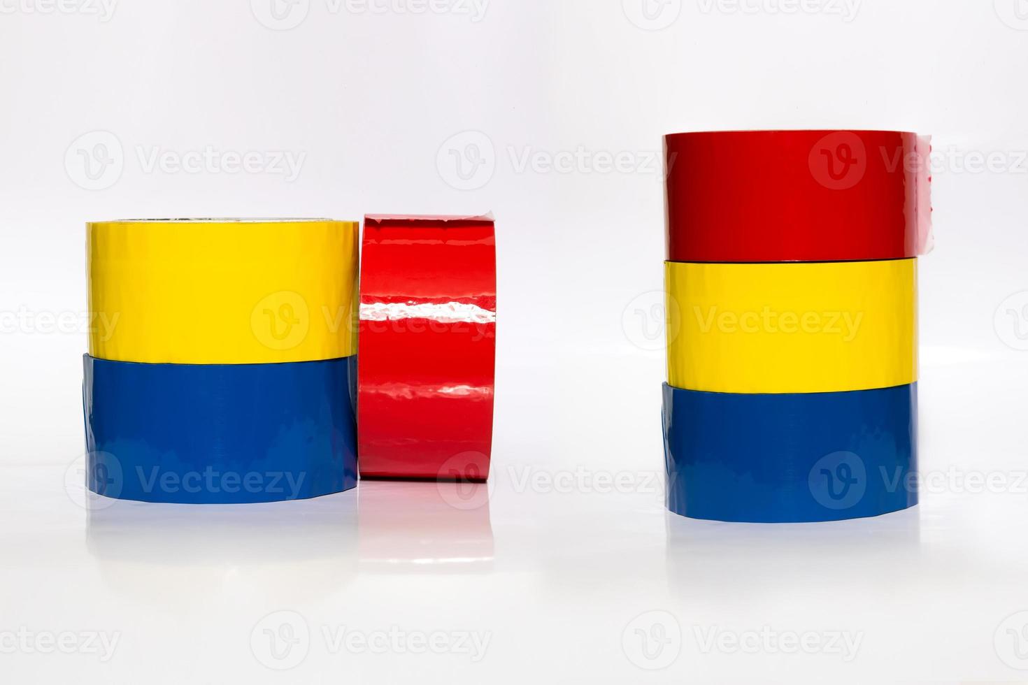 Colorful skeins of adhesive tape on a white background photo