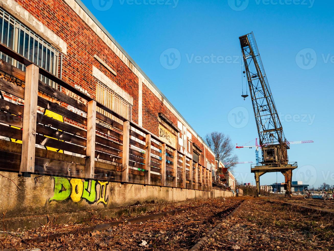 Old port, abandoned buildings, bridges, graffiti on the walls of houses in Strasbourg photo