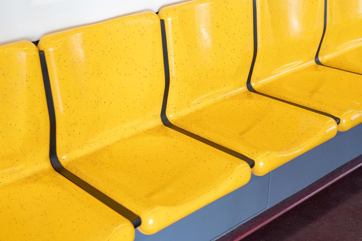 Bright yellow seats on the train photo