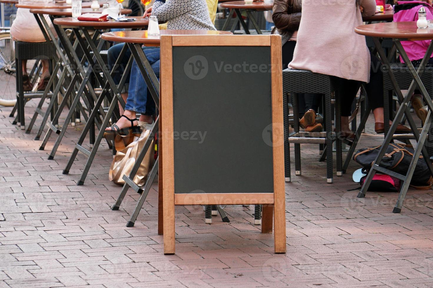 blank blackboard advertising sign or customer stopper photo