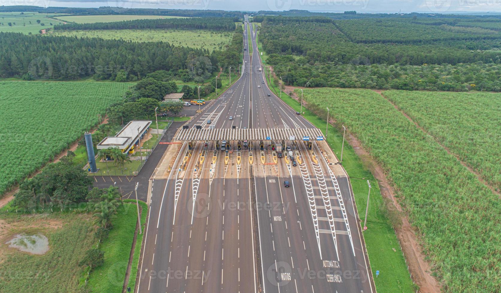 Aerial image highway toll plaza and speed limit, view of automatic paying lanes, non-stop. photo