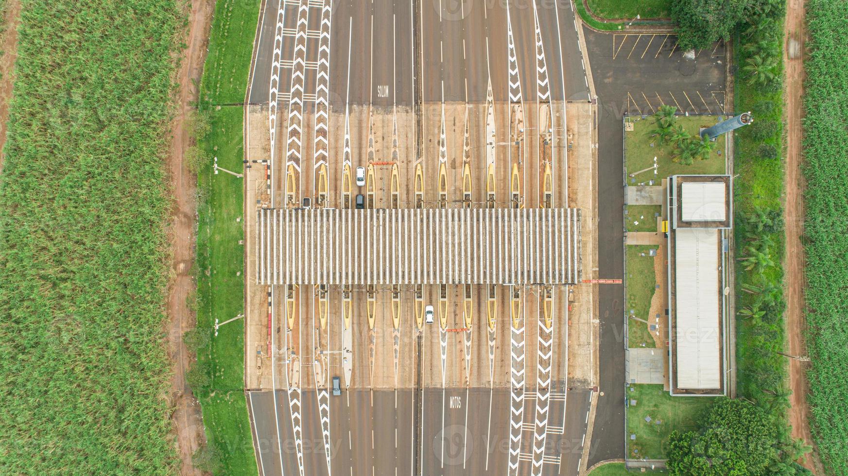 Aerial image highway toll plaza and speed limit, view of automatic paying lanes, non-stop. photo