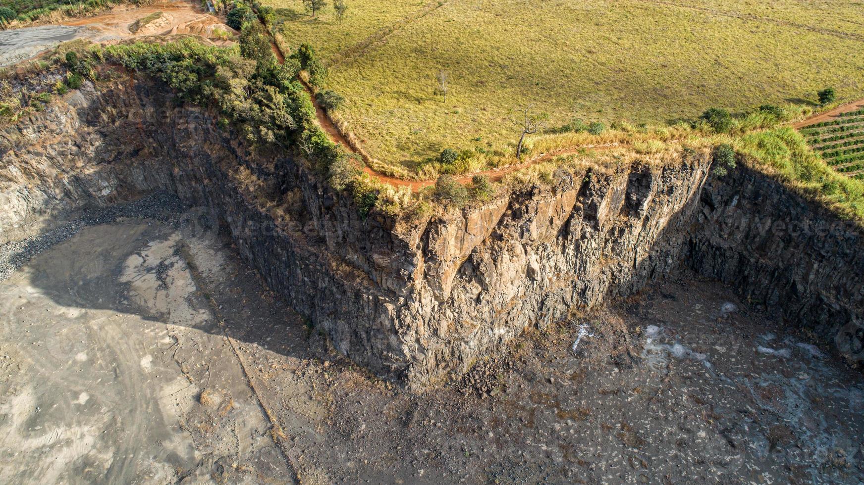 High angle view of a layered rock face seen on a quarry in Brazil. photo