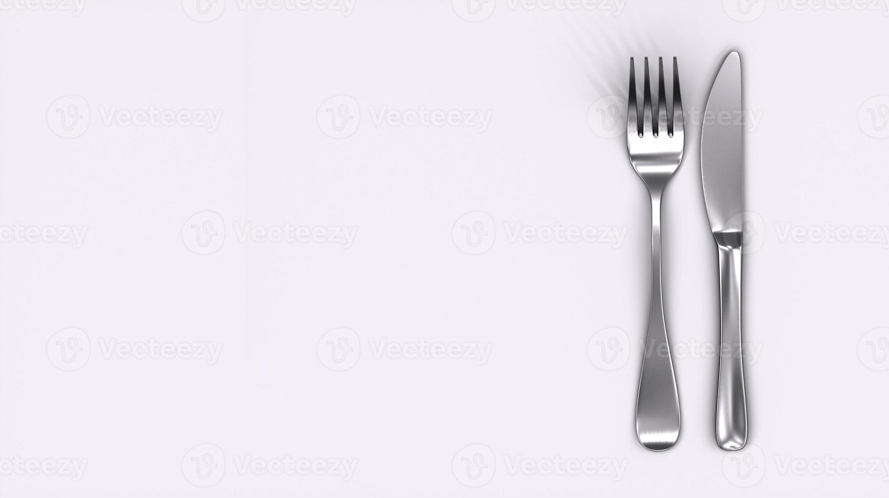 Knife and fork isolated on white background. Copy Space. Cooking icon. Symbol. photo