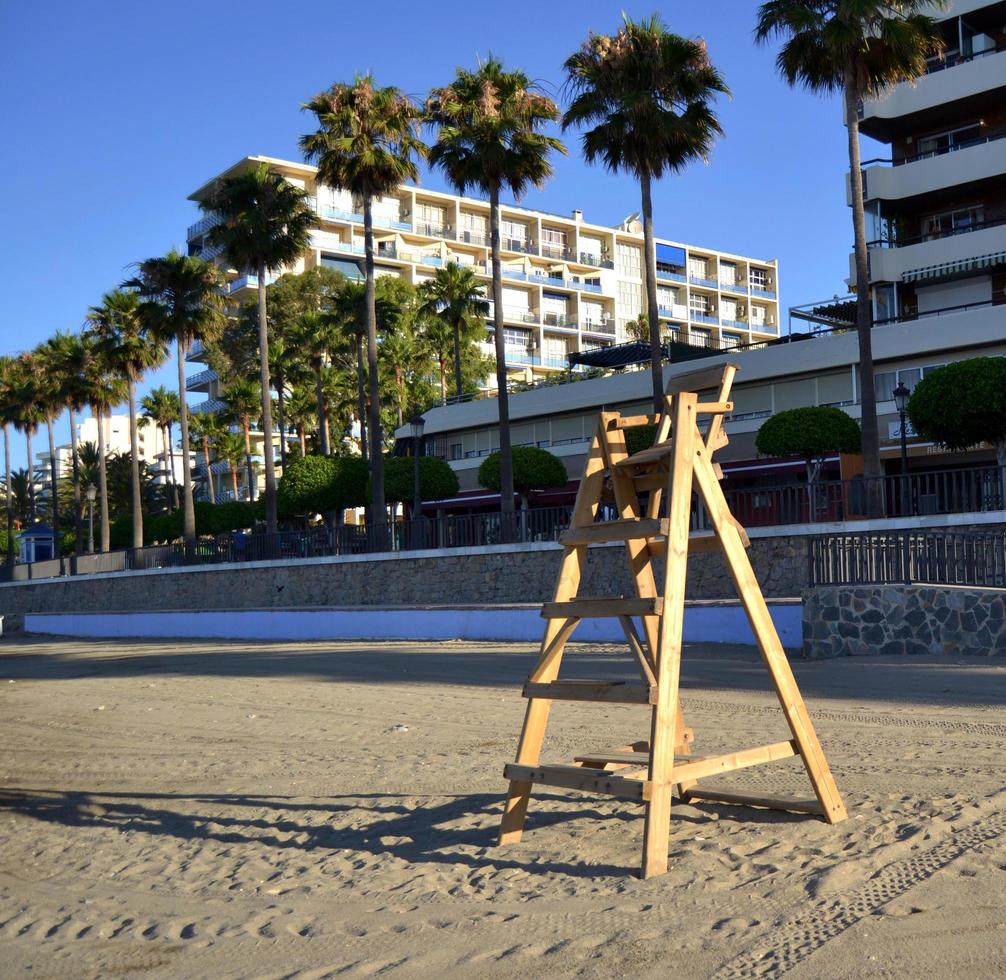 Lonely chair on the beach photo